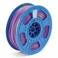 High-resolution hero shot of 3PI Tech Solutions Purple PLA 3D Printer Filament on a blue spool, from a three-quarter angle.